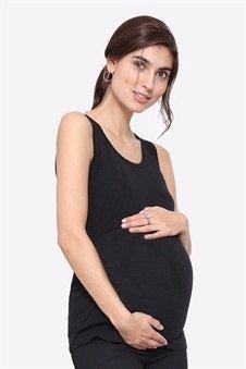 Schwarzes Stilltop, aus 100 Prozent Wolle, schwanger